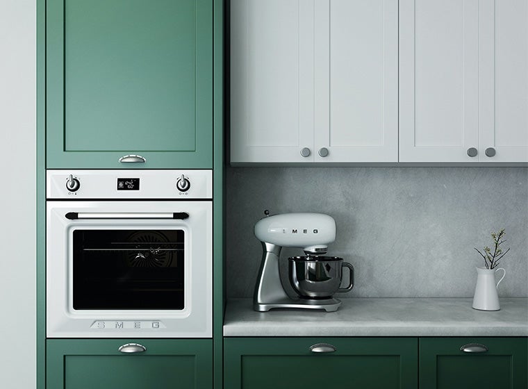 Classic old fashioned kitchen with green cabinets