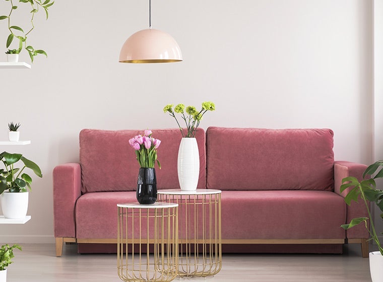 Modern minimalist living room with light pink interior 