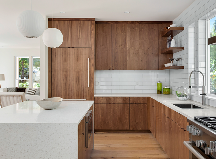 white walls with brown cabinets