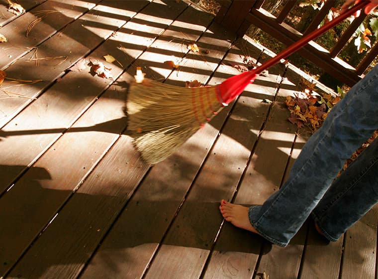 Sweeping Porch before painting