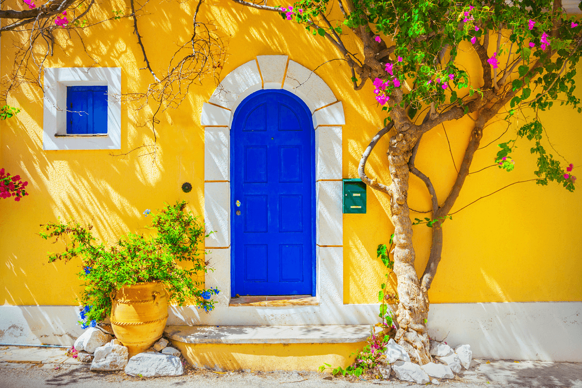 Mustard Yellow House with Blue Door